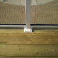 Second floor deck with glass panel barrier (detail)
