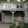 2 level deck with aluminum and glass railing (built with pressure treated lumber)
