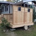 Cedar floating deck, railing and privacy wall with stained glass insterts