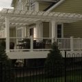 Large deck with pergola custom colour match to composite Trex railing with glass and baluster