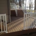 Trex Clip System Decking with wide baluster white railing and glass