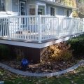 Trex decking and skirting with Regal wide picket railing