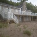 Large composite deck with Regal picket and glass railing