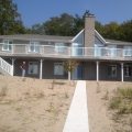 Large composite deck with Regal picket and glass railing