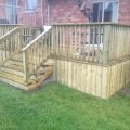 Pressure-treated deck with skirting