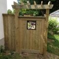 Custom gate with pergola top
