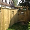 Custom gate with pergola top, fence with lattice insert